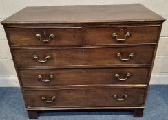 A GEORGIAN MAHOGANY CHEST OF TWO SHORT OVER THREE LONG GRADUATED DRAWERS, raised on bracket feet