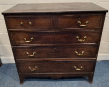 A GEORGIAN MAHOGANY CHEST OF TWO SHORT OVER THREE LONG GRADUATED DRAWERS, raised on bracket feet