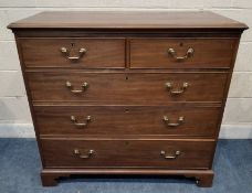A GEORGIAN MAHOGANY CHEST OF TWO SHORT OVER THREE LONG GRADUATED DRAWERS, raised on bracket feet