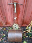 A VINTAGE CAST IRON GARDEN ROLLER by C.Green of Selly Oak Condition Report:wooden handles missing,