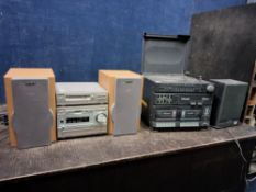 A SONY DHC-MD333 MINI HI FI with matching speakers (PAT pass and working) and an Osaki hi fi with