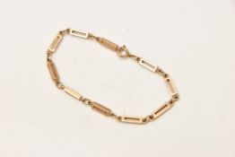 A 9CT GOLD FANCY LINK BRACELET, designed as a series of open work rectangular links, interspaced