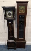 A 20TH CENTURY OAK CASED GRANDDAUGHTER CLOCK, the glass door enclosing an 8.25 inch dial,