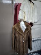 A GROUP OF LADIES' CLOTHING INCLUDING FURS, comprising a cream fur bolero jacket, length 48cm, UK