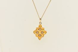 A 9CT YELLOW GOLD GEM SET PENDANT NECKLACE, oval cut yellow sapphires and round brilliant cut