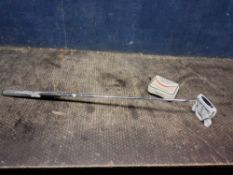 A TAYLOR MADE GHOST SPIDER PUTTER with cover