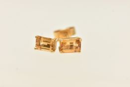 A PAIR OF YELLOW METAL GEM SET EARRINGS, rectangular cut citrines, prong set in yellow metal, push