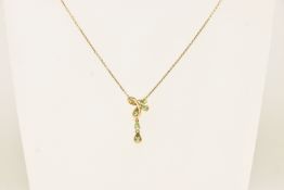 A 9CT YELLOW GOLD GEM SET PENDANT NECKLACE, pear cut peridot, prong and bezel set in a drop pendant,