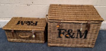 TWO FORTNUM AND MASON WICKER HAMPER BASKETS, each with a hinged lid and twin handles Dimensions: