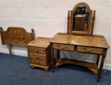 FOUR PIECES OF MODERN PINE FURNITURE, to include a dressing table with two drawers, raised on turned