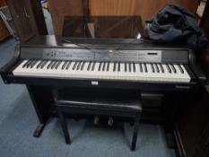 A TECHNICS PR40 DIGITAL PIANO, with a control panel and two pedals, along with a stool and cover