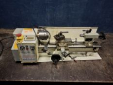 A CHESTER MACHINE TOOLS CONQUEST LATHE SUPER fitted with a three-jaw chuck, chuck key speed,