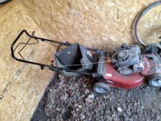A MOUNTFIELD SP185 SELF-PROPELLED PETROL LAWN MOWER with grassbox (engine pulls freely but hasn't