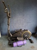 A REEBOK XR8 ELLIPTICAL with screen but no power supply, so UNTESTED, and an exercise matt Qty: 2