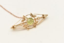 AN EARLY 20TH CENTURY BROOCH, an open work yellow metal brooch with foliage design, set with a