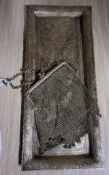A BRASS TRAY AND A CHAIN MAIL PURSE, the shallow rectangular tray engraved with floral motifs,