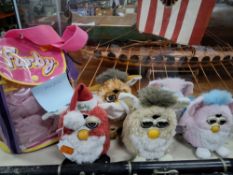 A COLLECTION OF FIVE ORIGINAL VINTAGE FURBYS comprising a Special Edition Santa Furby, Tiger