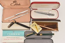 AN ASSORTMENT OF PENS, to include a cased 'Sheaffer' ball point pen, a cased 'Cross' 14k rolled gold
