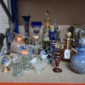 A GROUP OF COLOURED GLASS to include a Langham glass bird shaped paperweight, a fish shaped