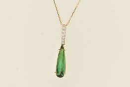 AN 18CT YELLOW GOLD GEM SET PENDANT NECKLACE, an elongated pear cut green tourmaline, prong set with