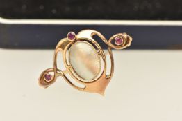 AN ARTS AND CRAFTS 'MURRLE BENETT' BROOCH, an open work yellow metal brooch, centrally set with a