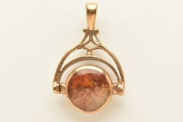 A 9CT GOLD GEM SET SWIVEL PENDANT, of a circular form set with a mother of pearl and an agate inlay,
