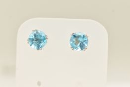 A PAIR OF WHITE METAL TOPAZ EARRINGS, large circular cut blue topaz, approximate width 8mm, prong