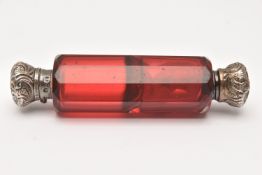 A LATE VICTORIAN DOUBLE ENDEND SCENT BOTTLE, a cranberry glass double ended scent bottle,