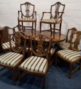 A REPRODUCTION YEW WOOD TWIN PEDESTAL DINING TABLE, two additional leaves, each pedestal with