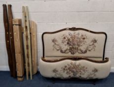 A FRENCH 4FT6 BEDSTEAD, with beige and foliate upholstery Condition Report:general signs of wear and