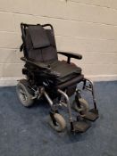 A KYMCO K-ACTIV ELECTRIC WHEELCHAIR with charger (PAT passed and working) Condition Report:some wear