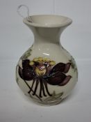 A MOORCROFT POTTERY COLUMBINE BALUSTER VASE, tube-lined with red and yellow flowers on a cream
