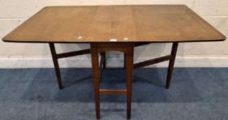 A MID-CENTURY TEAK GATE LEG TABLE, raised on tapered legs, united by stretchers Dimensions:open