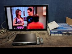 A SAMSUNG UE46B8000 46in TV with remote, partial wall bracket but no stand and a Panasonic Blu-ray