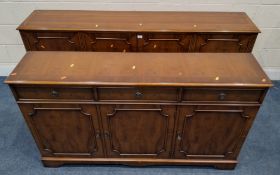 TWO REPRODUCTION YEW WOOD SIDEBOARDS, the larger sideboard with four cupboard doors, the other