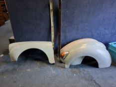 A COLLECTION OF MORRIS MINOR BODY PARTS, including one nearside front wing, two offside rear