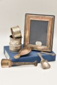 AN ASSORTMENT OF SILVER ITEMS, to include a shell shape caddy spoon, hallmarked Sheffield, three