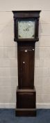 AN OAK CASED 8 DAY LONGCASE CLOCK, the glass door enclosing a 12-inch dial, depicting Arabic