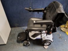 A RASCAL RIO ELECTRIC WHEELCHAIR (PAT pass and working, but battery integrity unknown) Condition