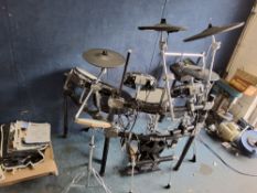 A ROLAND V DRUM SYNTHESISER with a TD12 controller, kick, snare and four tom pads, hi hat, three