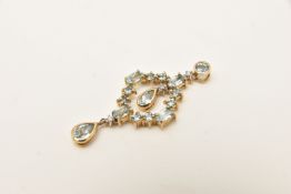 A 9CT YELLOW GOLD GEM SET PENDANT, open work drop pendant set with pear, oval and round cut light