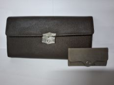 A GLOVE/HANDKERCHIEF CASE AND A SEWING CASE, the glove case in dark brown textured leather, with red