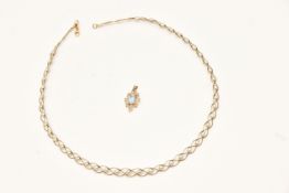A PENDANT AND NECKLACE, to include a yellow metal open work pendant set with light blue topaz,