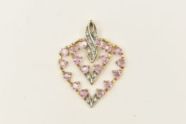 A 9CT YELLOW GOLD GEM SET PENDANT, an open work heart pendant, set with pink sapphire and