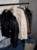 A GROUP OF FOUR FUR ITEMS, to include a black rabbit fur jacket approximately UK ladies size 10,