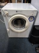 A WHITE KNIGHT 38AW TUMBLE DRYER with vent pipe (PAT passed and working) Dimensions:50x48x67cm high