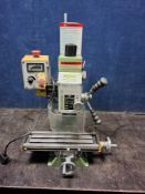 A WARCO VM-14 VS MILLING MACHINE with speed adjuster with digital read out, table size 400 x