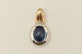 A 9CT BI COLOUR GEM SET PENDANT, an oval cabochon sapphire, bezel set in white gold, flanked with