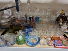 A SMALL GROUP OF HOUSEHOLD GLASSWARE to include a pair of impressive decanters, a set of long