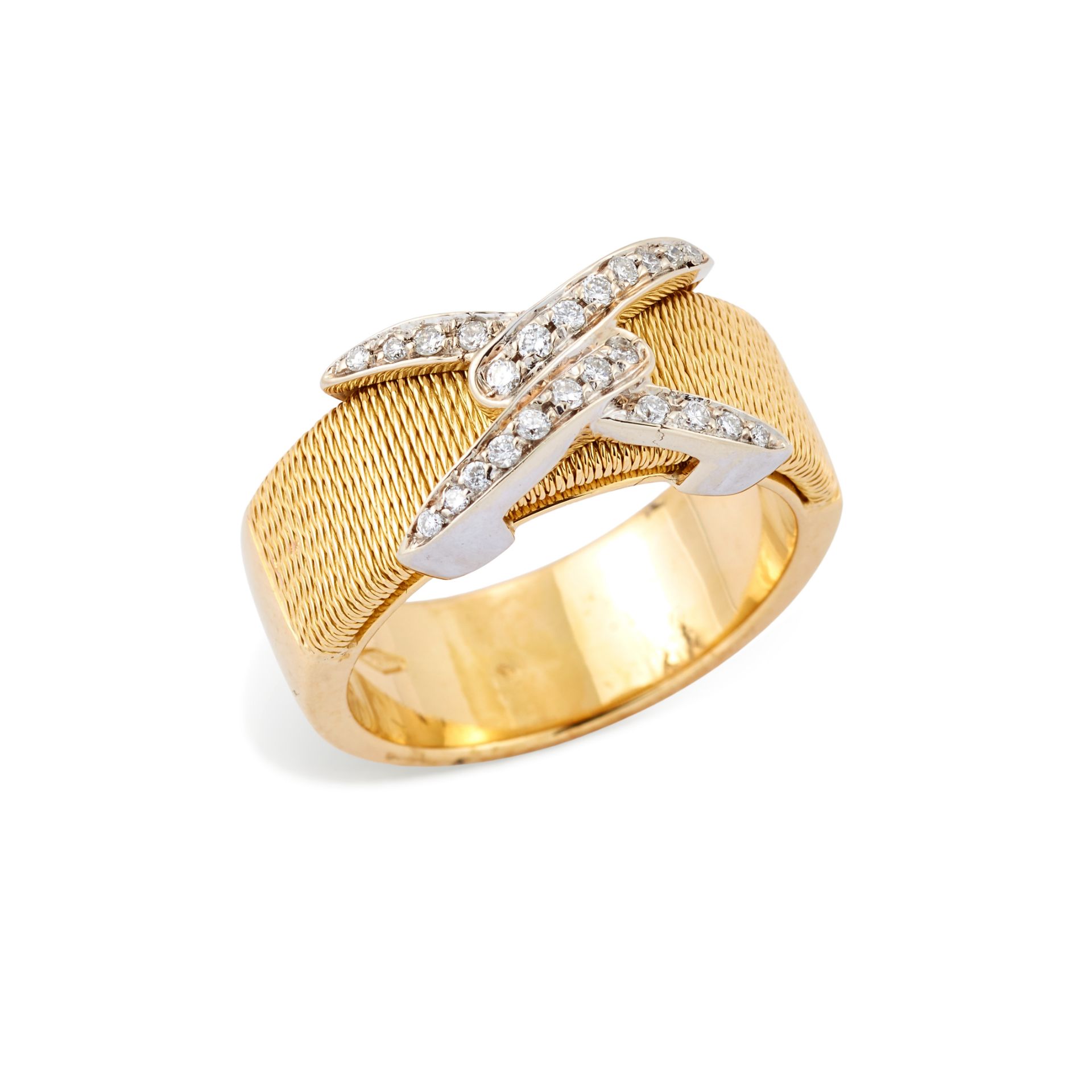 A diamond set ring, compsed of an applied diamond set panel in the form of two interlocking 'V' s...